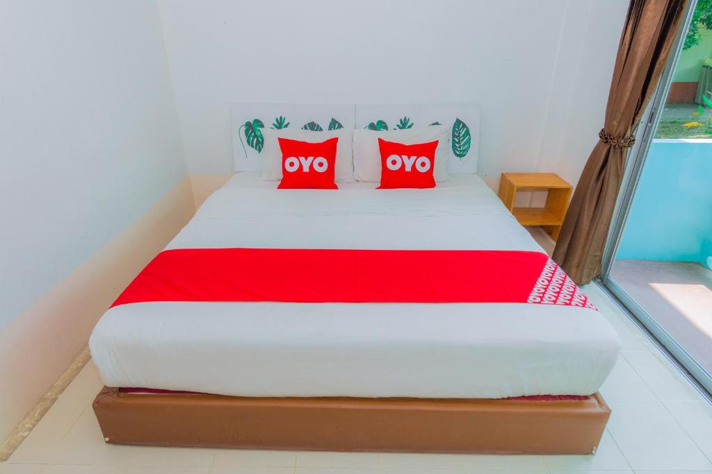 Postel nebo postele na pokoji v ubytování Koh Lak Resort