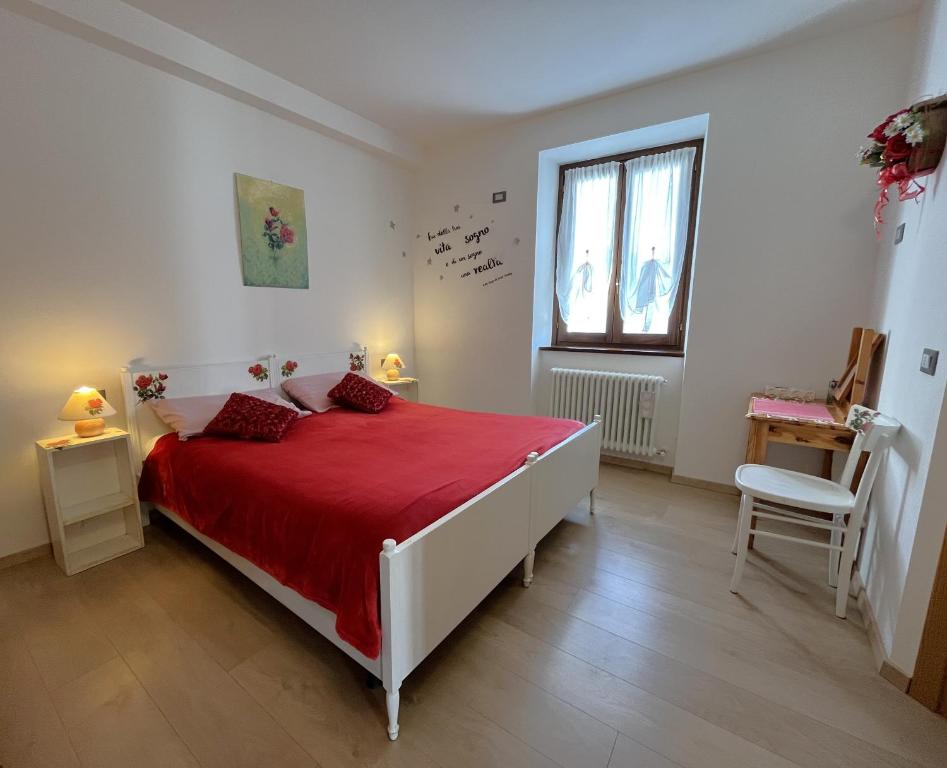 Postel nebo postele na pokoji v ubytování B&B Casa Taralin