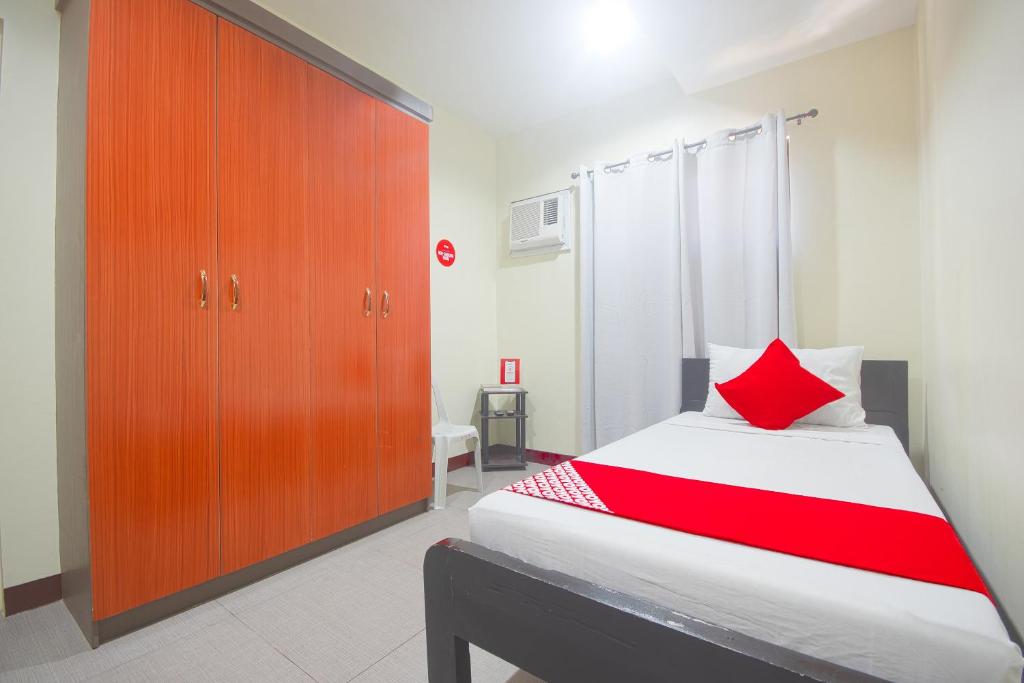 Postel nebo postele na pokoji v ubytování OYO 567 Blue Horizon Hostel