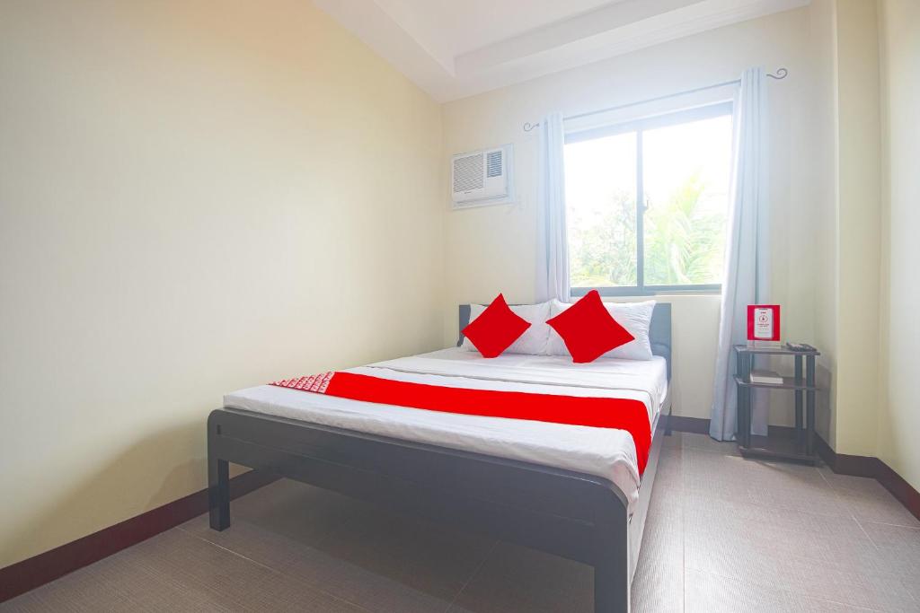 Postel nebo postele na pokoji v ubytování OYO 567 Blue Horizon Hostel