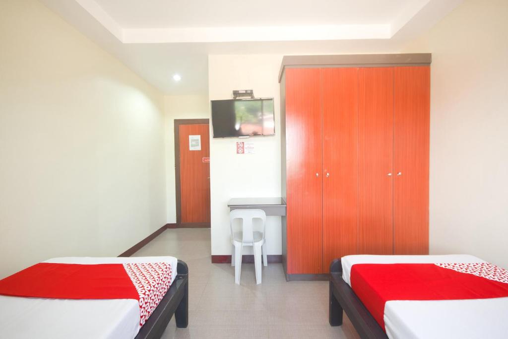 Postel nebo postele na pokoji v ubytování OYO 567 Blue Horizon Hostel