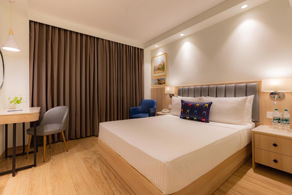 Postel nebo postele na pokoji v ubytování Keys Prima by Lemon Tree Hotels, Pimpri, Pune