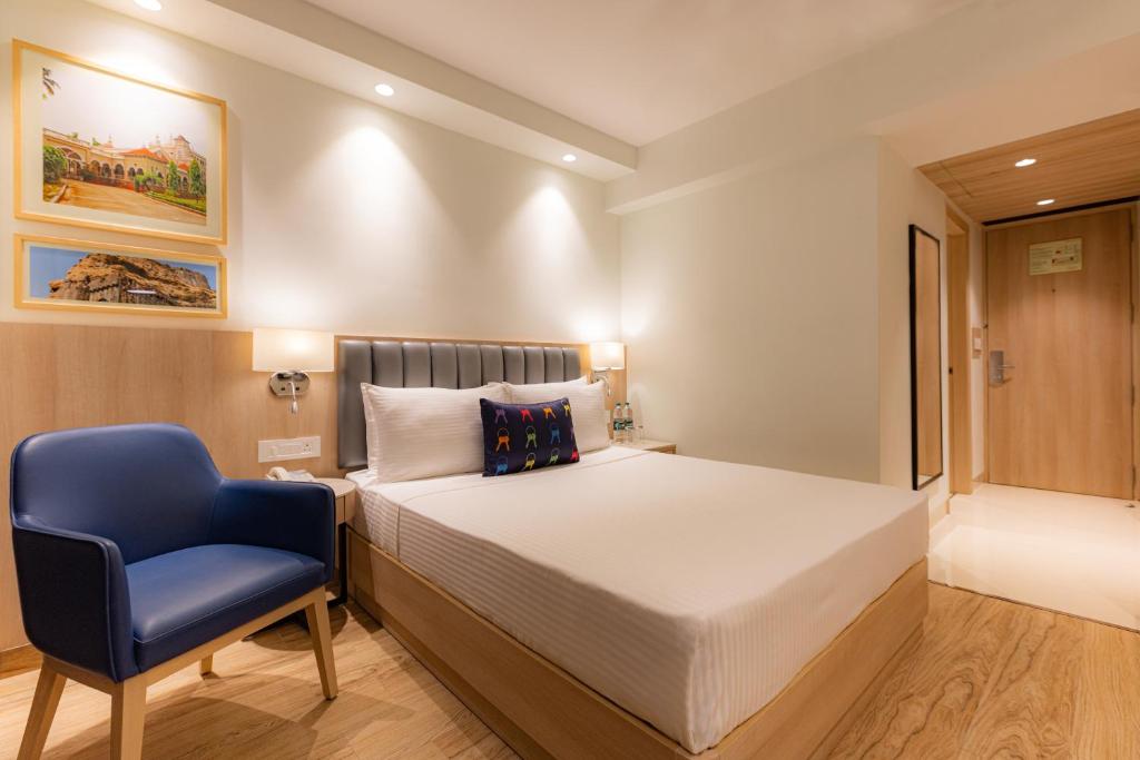 Postel nebo postele na pokoji v ubytování Keys Prima by Lemon Tree Hotels, Pimpri, Pune
