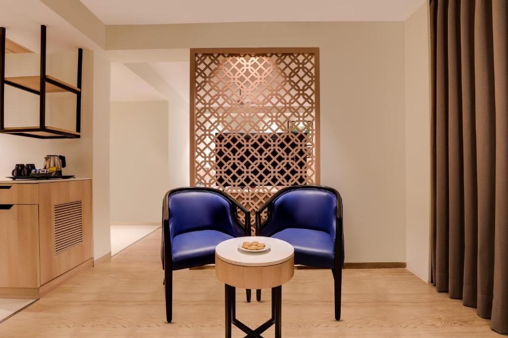 Posezení v ubytování Keys Prima by Lemon Tree Hotels, Pimpri, Pune