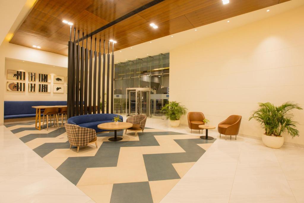 Posezení v ubytování Keys Prima by Lemon Tree Hotels, Pimpri, Pune
