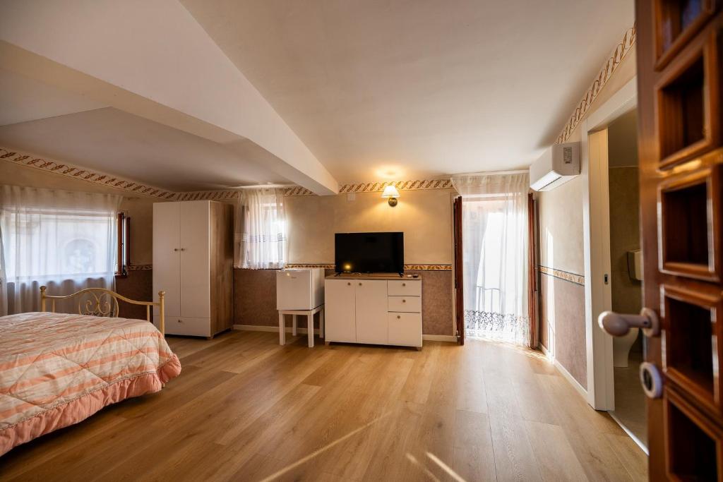 Letto o letti in una camera di Casa Vacanze Francy House