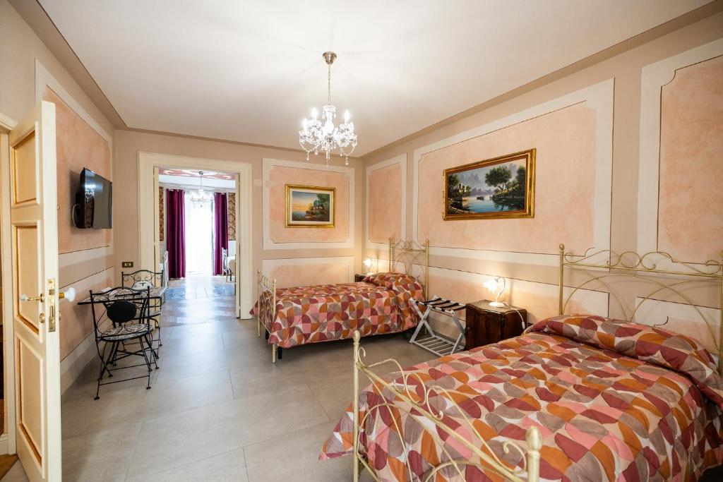 Letto o letti in una camera di Casa Vacanze Francy House