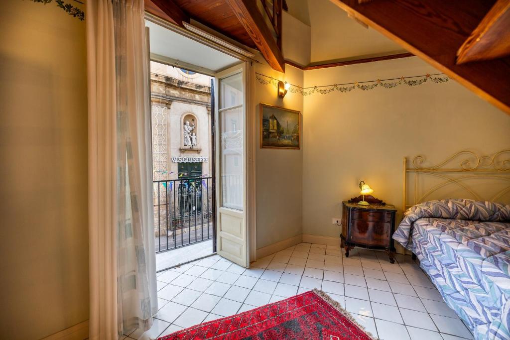 Letto o letti in una camera di Casa Vacanze Francy House