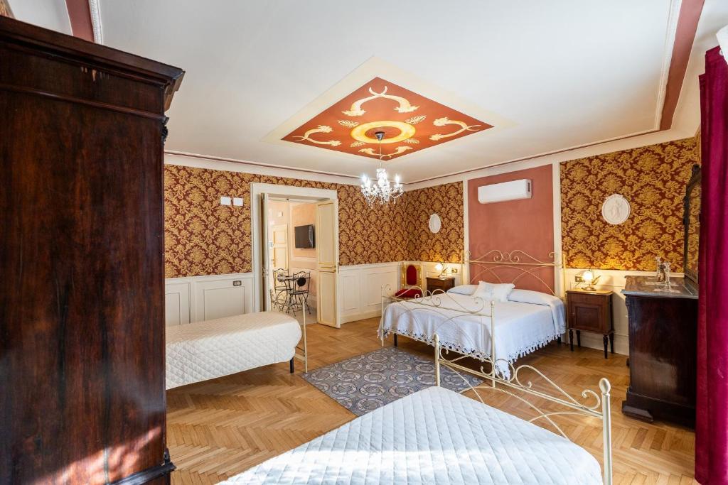 Letto o letti in una camera di Casa Vacanze Francy House