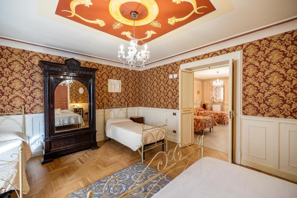 Letto o letti in una camera di Casa Vacanze Francy House