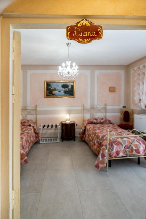 Letto o letti in una camera di Casa Vacanze Francy House