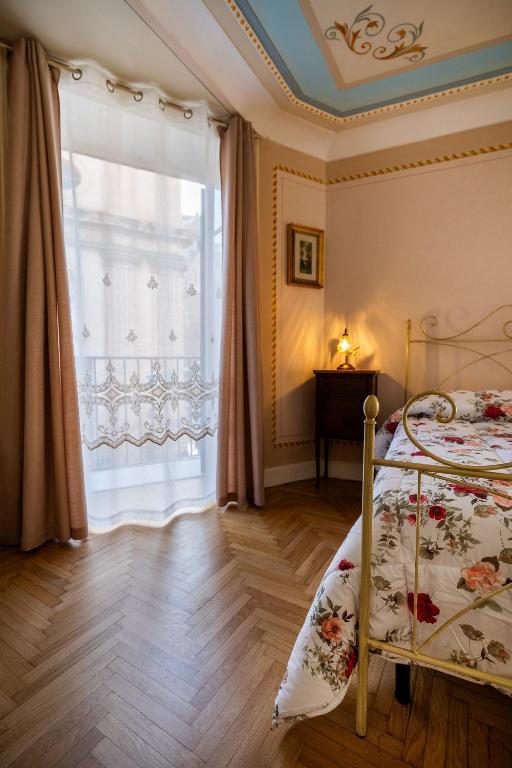 Letto o letti in una camera di Casa Vacanze Francy House