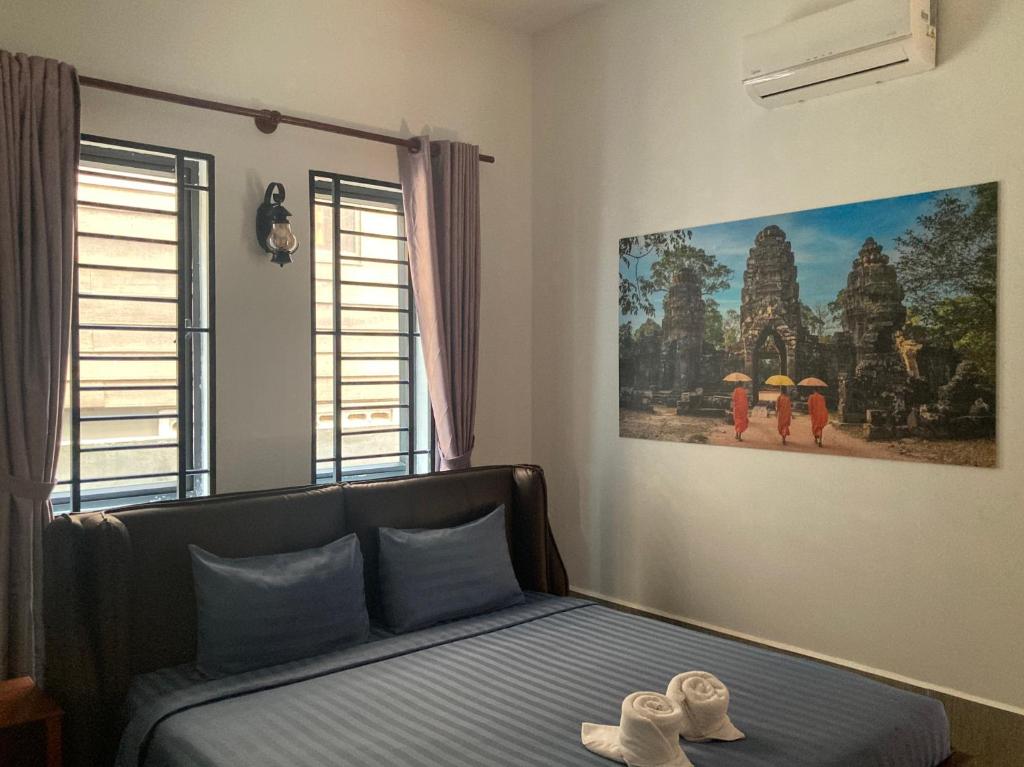 Postel nebo postele na pokoji v ubytování Lotus Haven Villa