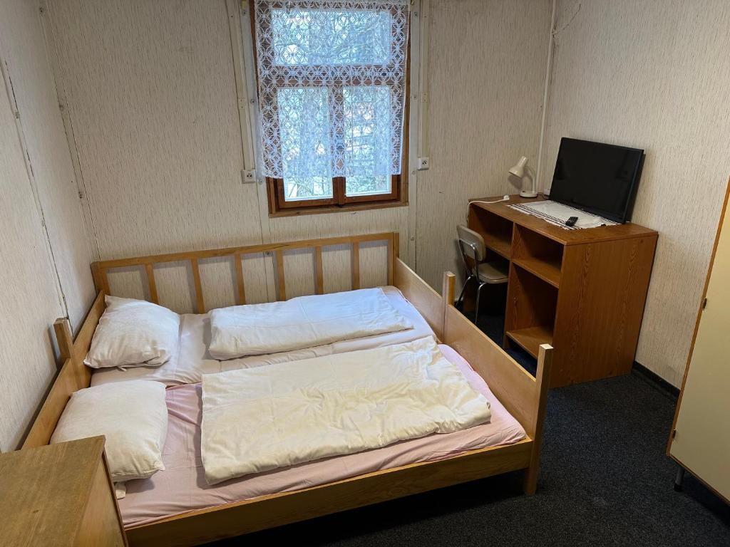 Postel nebo postele na pokoji v ubytování Chata Elda