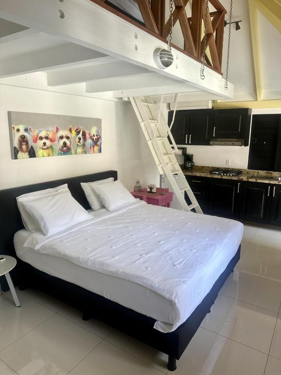 Postel nebo postele na pokoji v ubytování Yemaya Guesthouse Curaçao