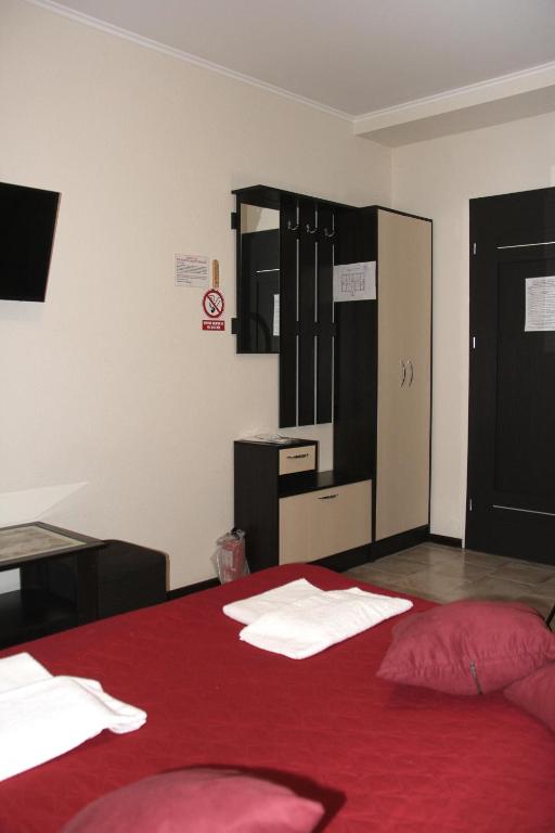 Postel nebo postele na pokoji v ubytování Breeze Hotel