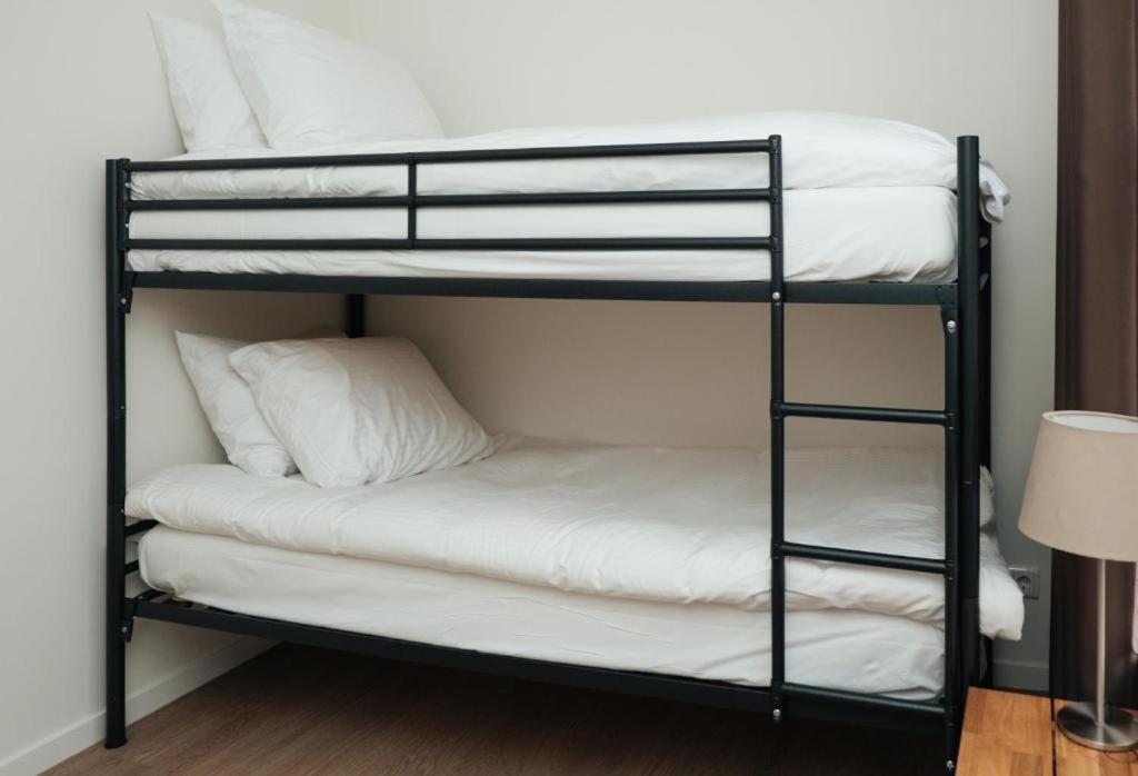 Postel nebo postele na pokoji v ubytování Boutique Hotel Lumiere