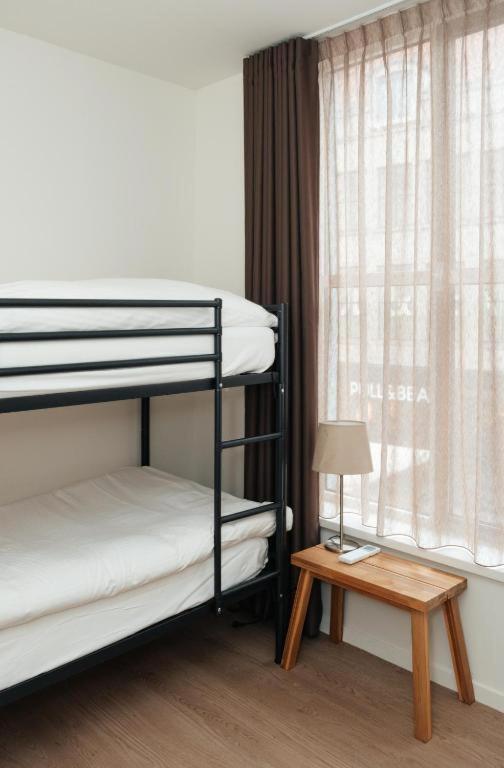 Postel nebo postele na pokoji v ubytování Boutique Hotel Lumiere