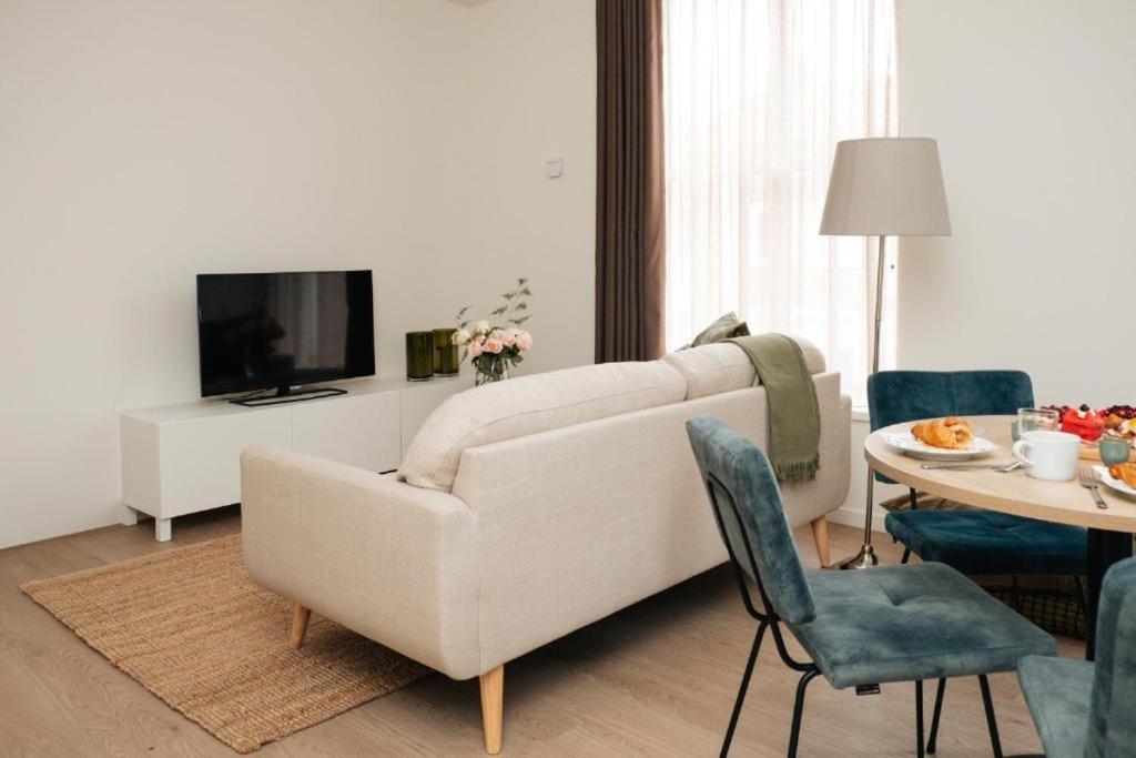 TV a/nebo společenská místnost v ubytování Boutique Hotel Lumiere