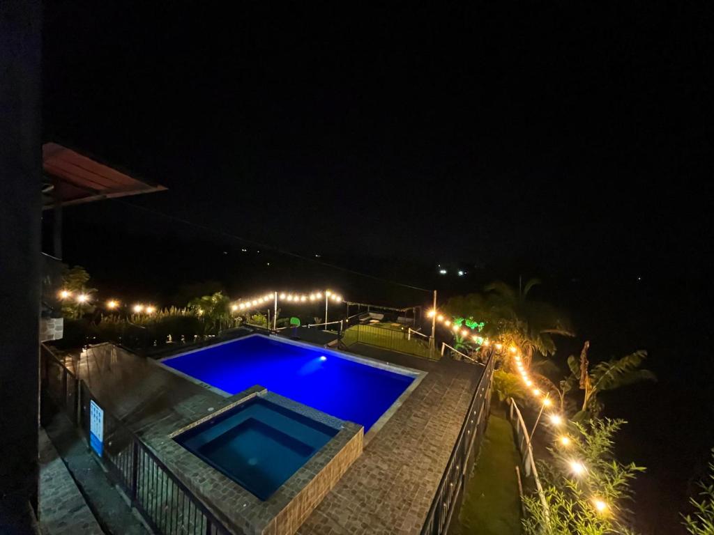 Bazén v ubytování Hotel Campestre Quimbaya Cafetero nebo v jeho okolí