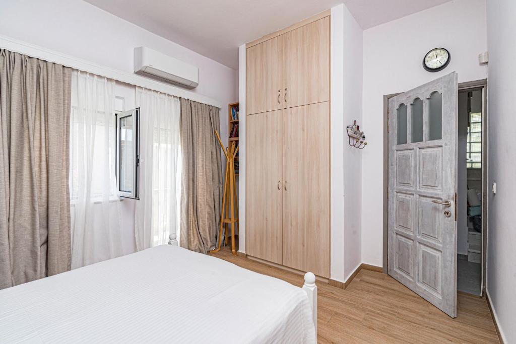 Posteľ alebo postele v izbe v ubytovaní Big Blue Exclusive Beachfront Villa