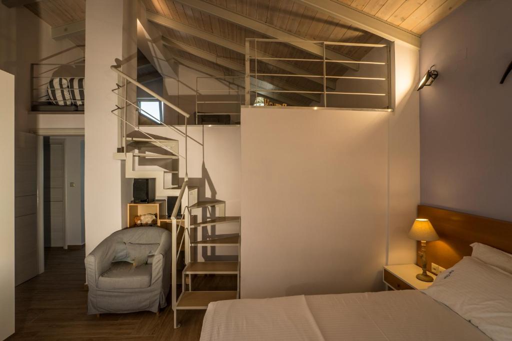 Posteľ alebo postele v izbe v ubytovaní Big Blue Exclusive Beachfront Villa