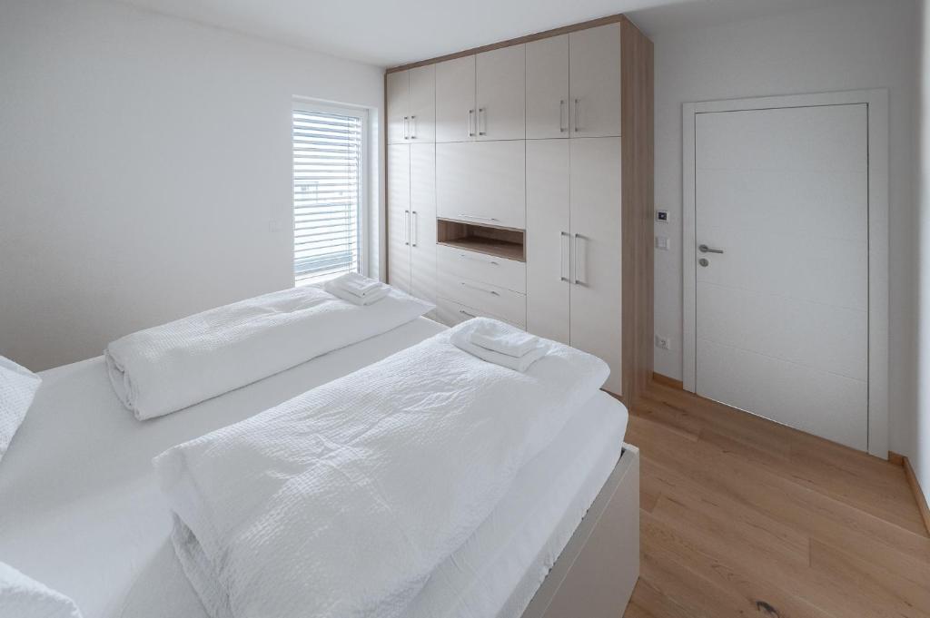 Postel nebo postele na pokoji v ubytování Amaria Downtown Aparthotel Villach