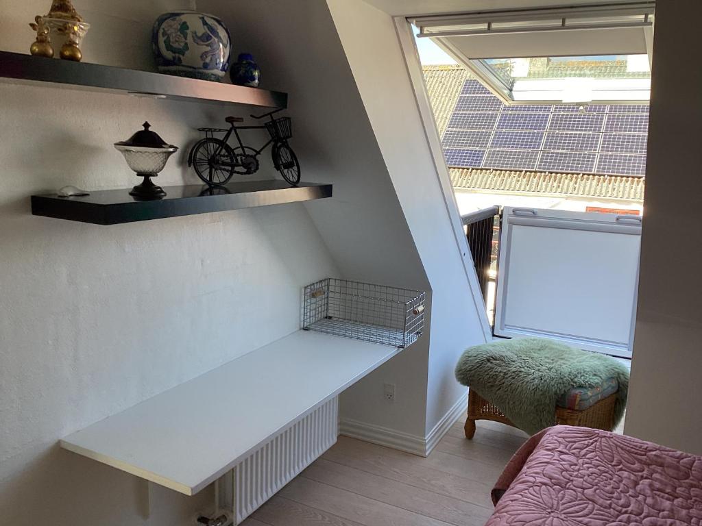 Posezení v ubytování Dejlig feriehus i den gamle bydel