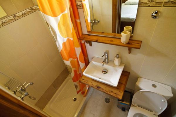 Koupelna v ubytování Mango Rooms