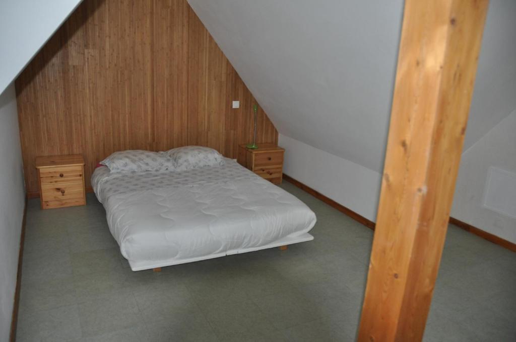 Postel nebo postele na pokoji v ubytování Chambre meublée en duplex indépendante