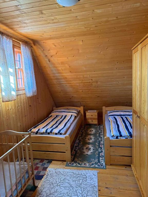 Postel nebo postele na pokoji v ubytování Chata U Juraja