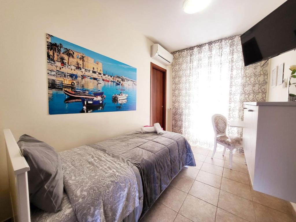 A bed or beds in a room at B&B Waltanna Airport