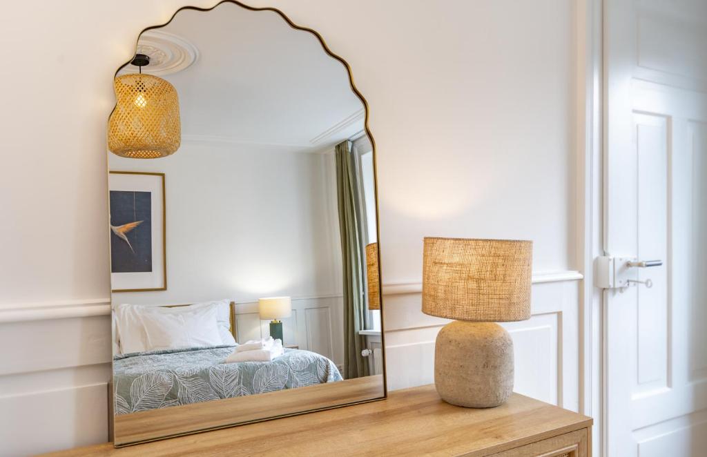 Postel nebo postele na pokoji v ubytování Boho Suite