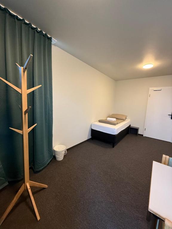 Postel nebo postele na pokoji v ubytování Skogar Hostel