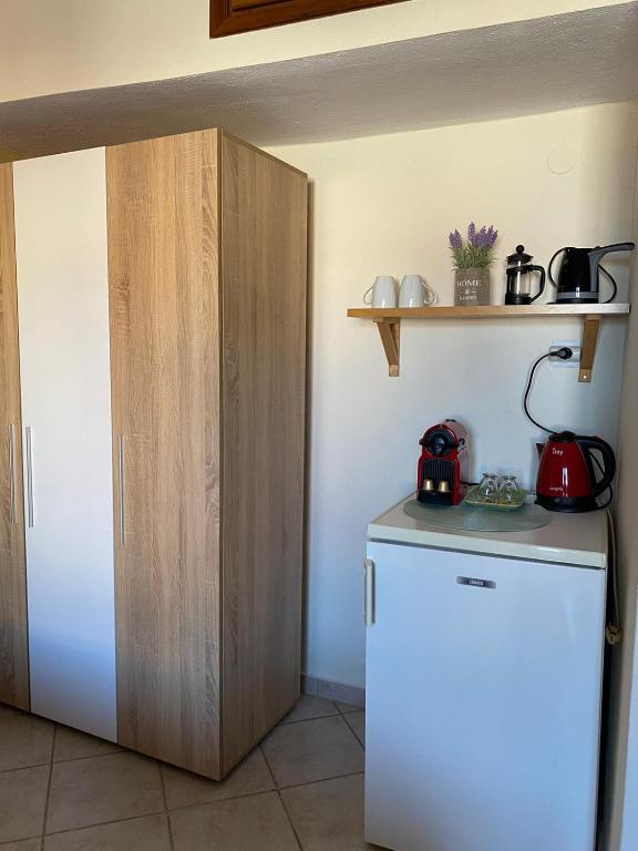 Kuchyň nebo kuchyňský kout v ubytování Miranda Studios