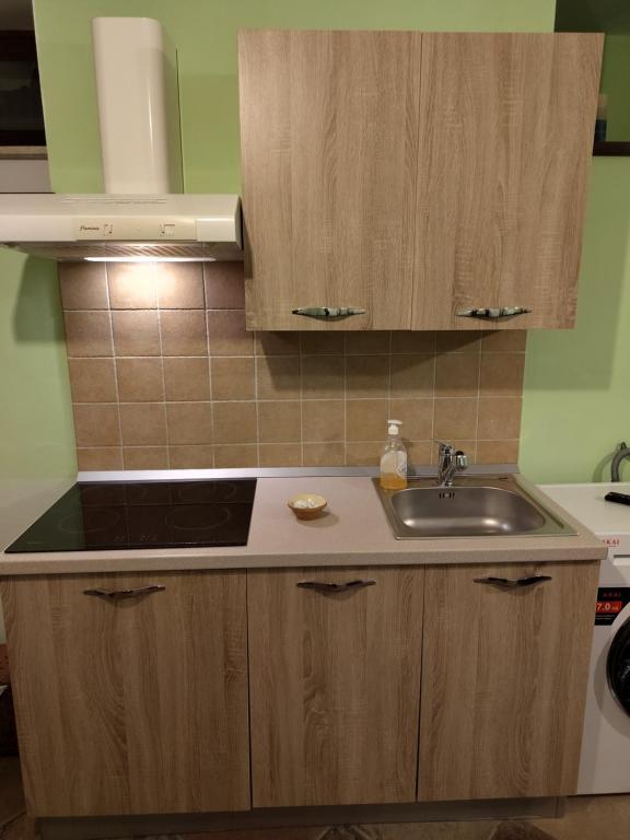 Kuchyň nebo kuchyňský kout v ubytování D&M Home