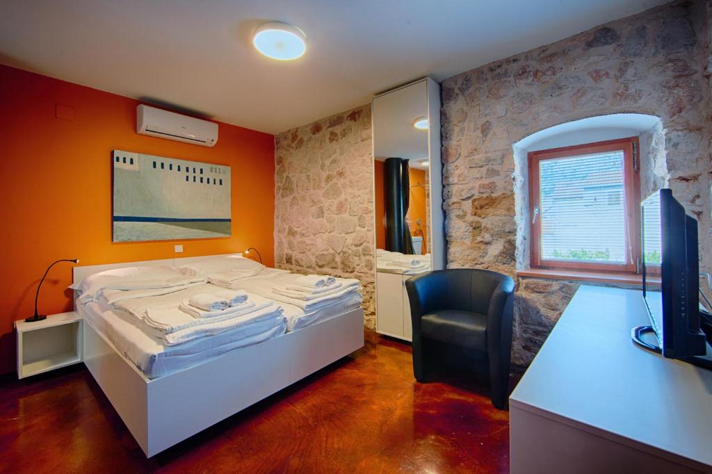 Postel nebo postele na pokoji v ubytování Villa Maris