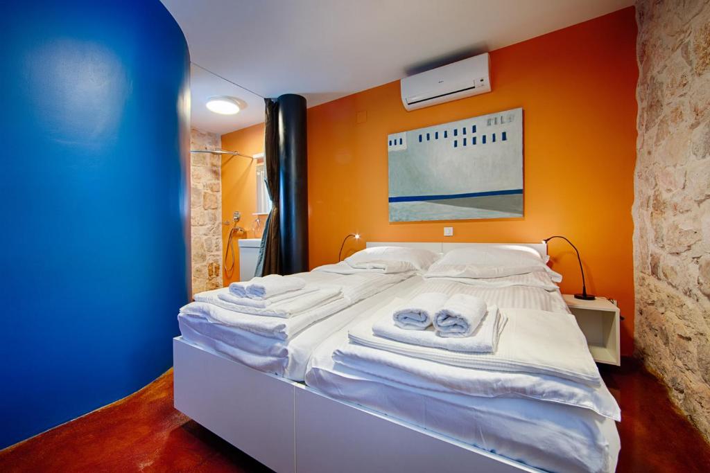 Postel nebo postele na pokoji v ubytování Villa Maris