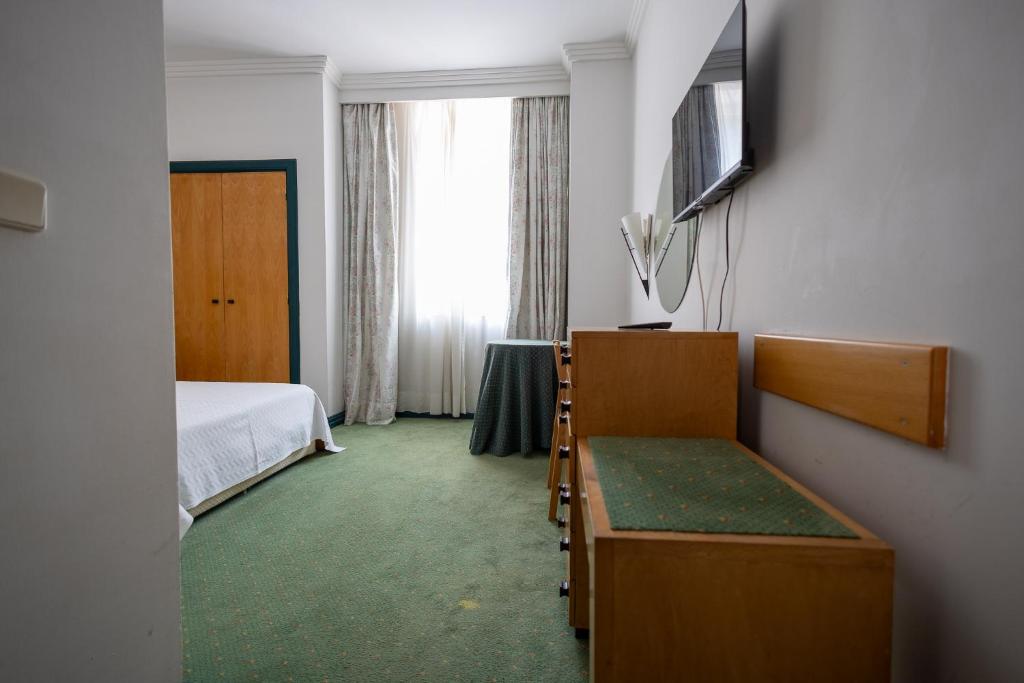 TV a/nebo společenská místnost v ubytování Hotel Das Termas