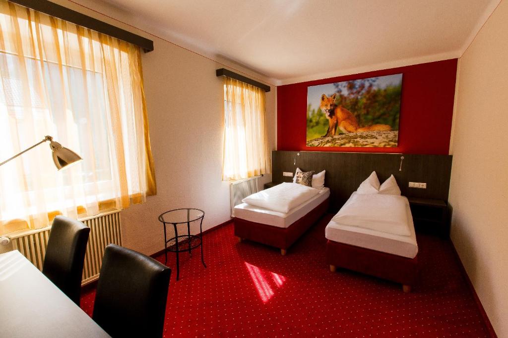 Postel nebo postele na pokoji v ubytování Wallner - Hotel & Wirt