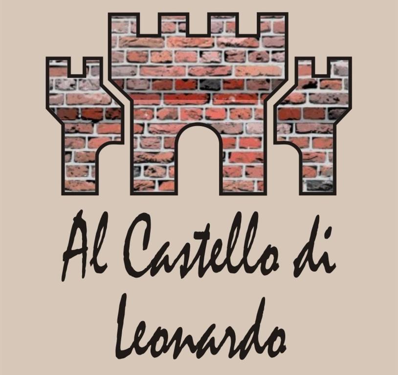 a brick wall with the words all celtic at londondro at Al Castello di Leonardo in SantʼAngelo Lodigiano