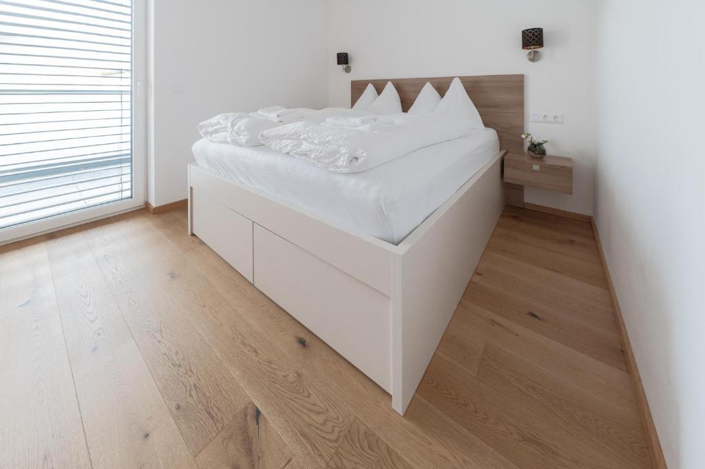 Postel nebo postele na pokoji v ubytování Amaria Downtown Aparthotel Villach