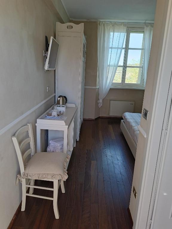 Postel nebo postele na pokoji v ubytování Agriturismo La Quercia
