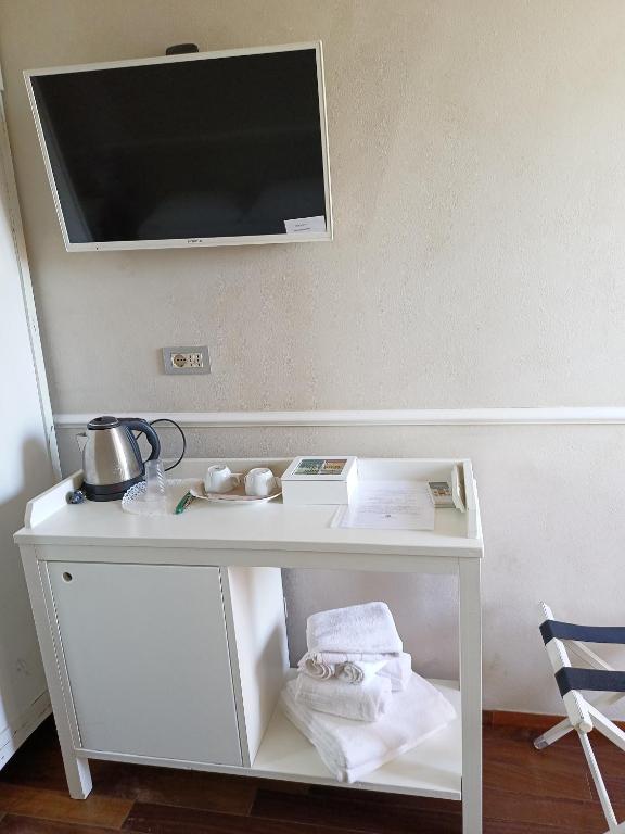 TV a/nebo společenská místnost v ubytování Agriturismo La Quercia