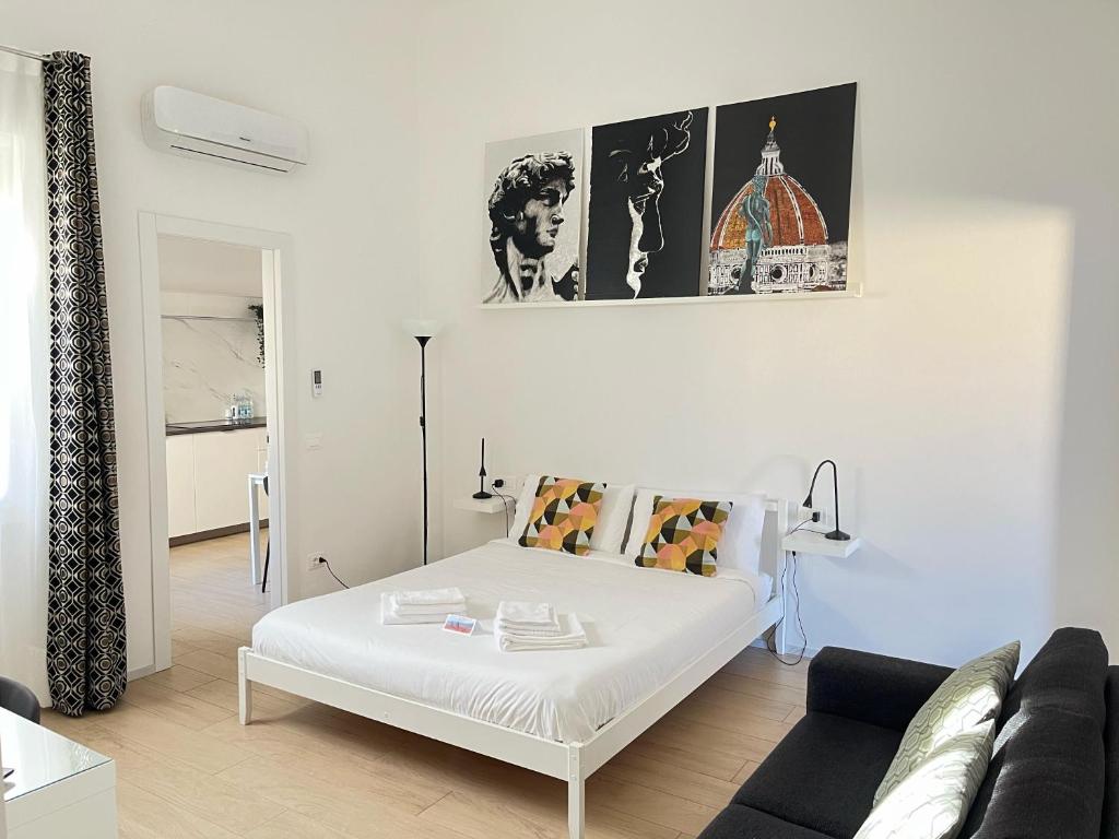 Postel nebo postele na pokoji v ubytování Florence Apartment 10 min dal centro-50 mt tram