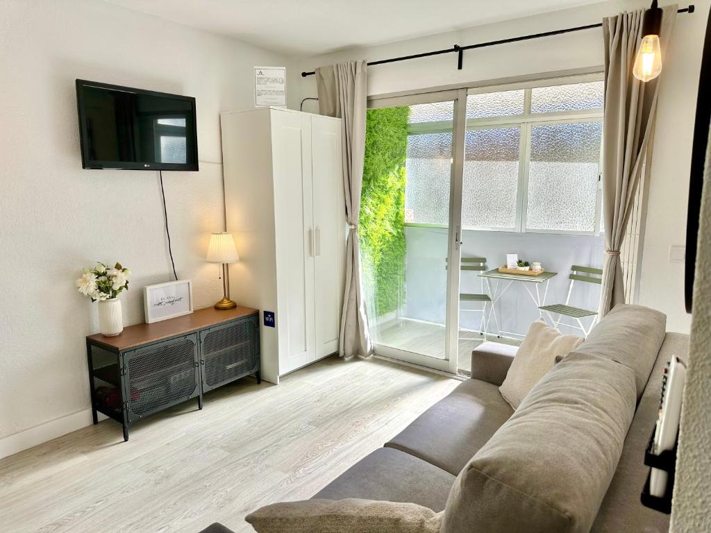 A television and/or entertainment centre at FUENGIROLA Los Boliches MALAGA - GREEN LOVE