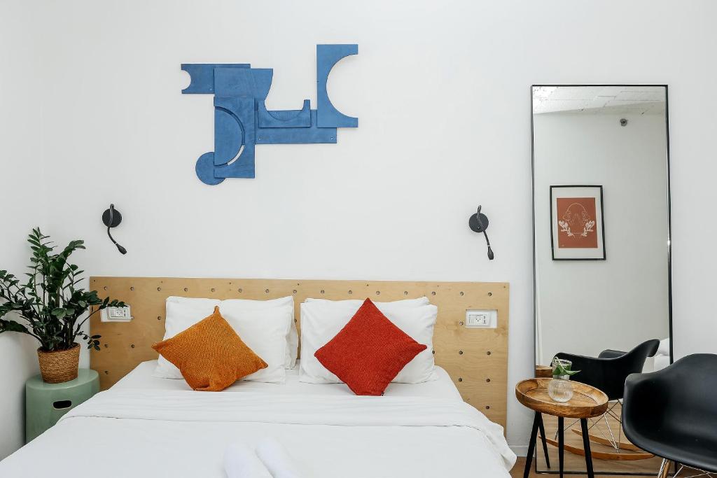 Postel nebo postele na pokoji v ubytování Domus Metro Hotel