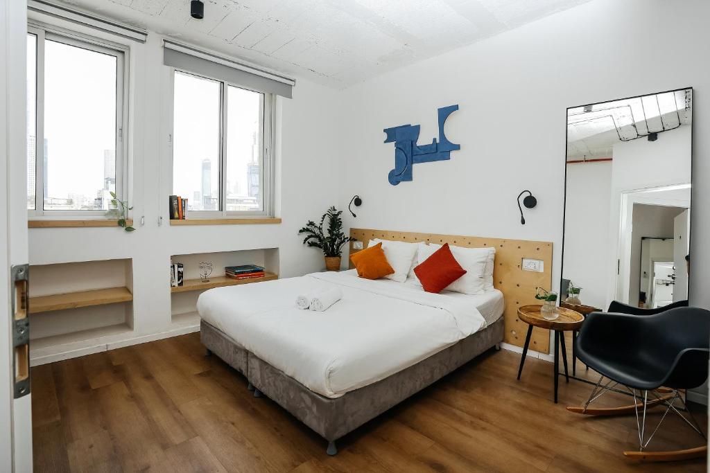 Postel nebo postele na pokoji v ubytování Domus Metro Hotel