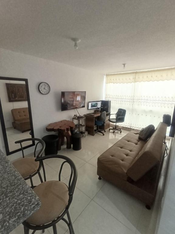 Posezení v ubytování Apartamento Amoblado con Excelente Ubicación