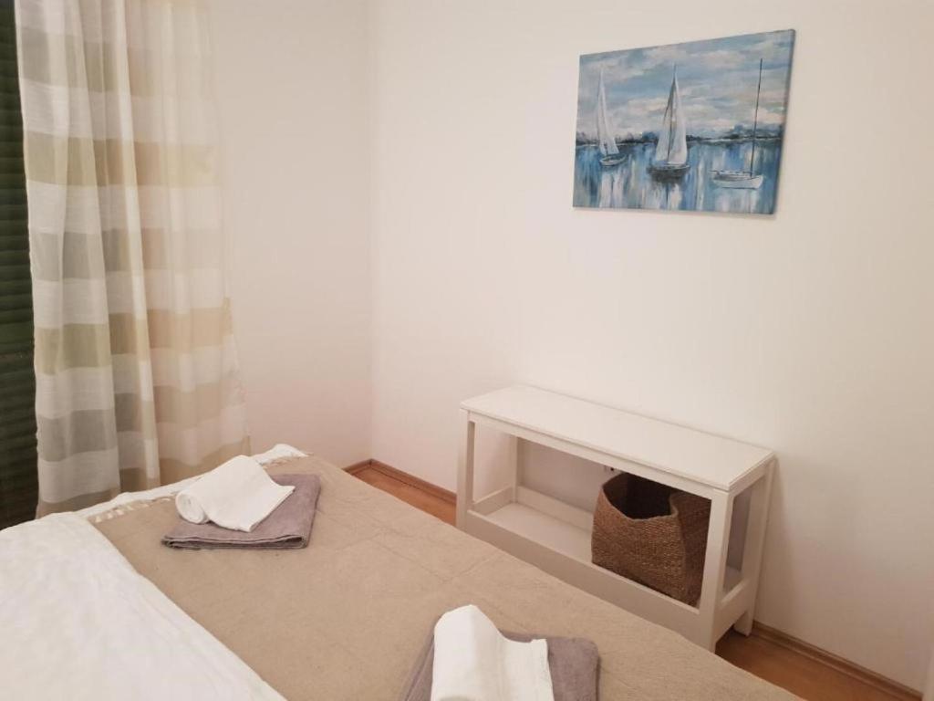 Posteľ alebo postele v izbe v ubytovaní Apartments Kike